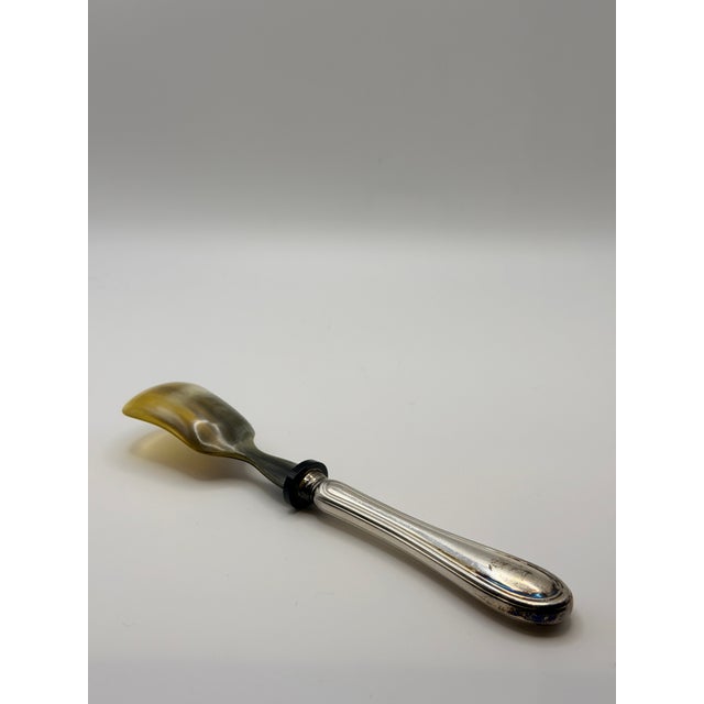 Elegant Italian caviar serving spoon by Greggio, crafted in Italy. This refined piece features a natural horn bowl, ideal...