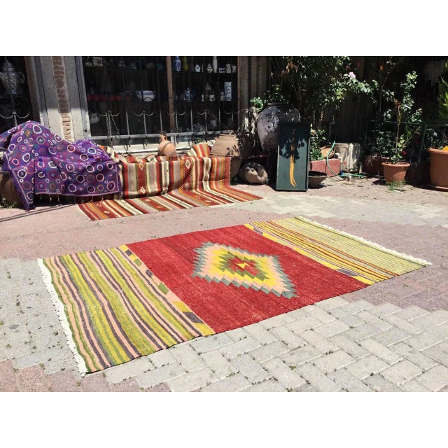 Beautiful, vintage, handwoven Kilim is approximately 60 years old. It is handmade of very fine quality, hand-spun wool in...