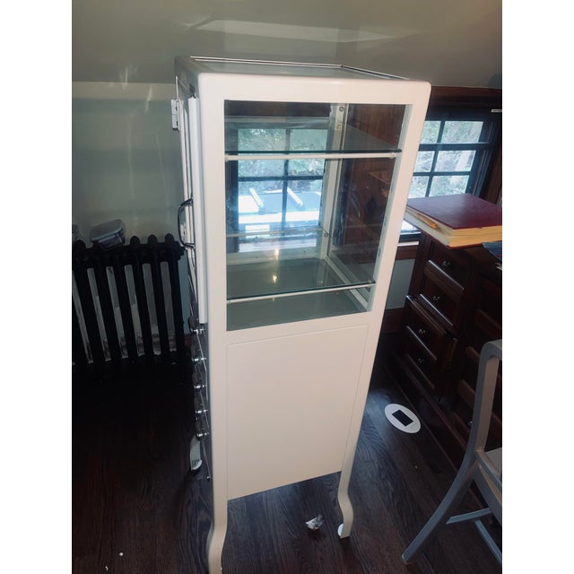 This pharmacy cabinet is manufactured by Dulton for Restoration Hardware’s retired industrial cabinet collection. This...