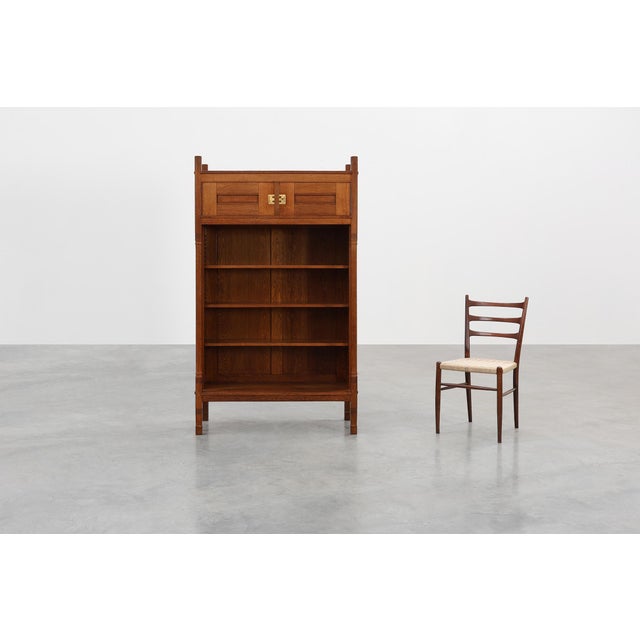 An elegant Jugendstil oak bookcase from the Netherlands or Belgium, dating to the early 20th century. Crafted in solid...