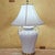 Vintage Paul Hanson-style ceramic urn table lamp featuring an elegant twin-handled silhouette with raised botanical leaf...