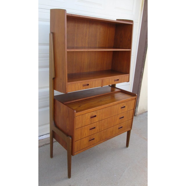 Vintage Teak and Oak Scandinavian Secretary Bookcase. The Mid Century / Danish Modern piece has 3 bottom drawers in the...