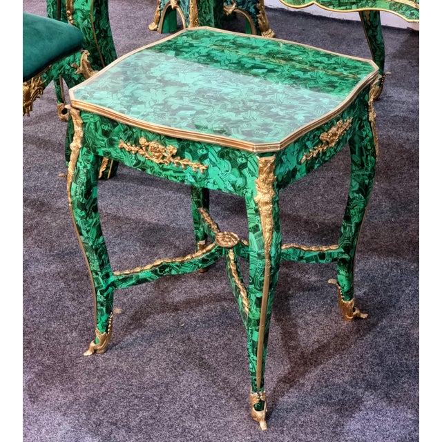Add a striking touch of European luxury to your interior with this French Louis XV-inspired side table, featuring an eye-...