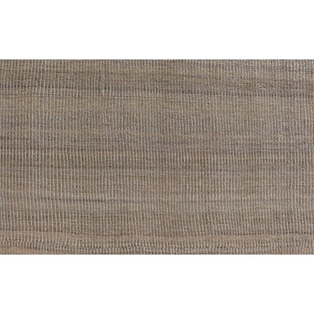 Measures: 9'3 x 12'4 Handwoven Textured Kilim Rug in Beige, Cream, and Soft Brown Tones 9'3 x 12'4. Keivan Woven Arts /...