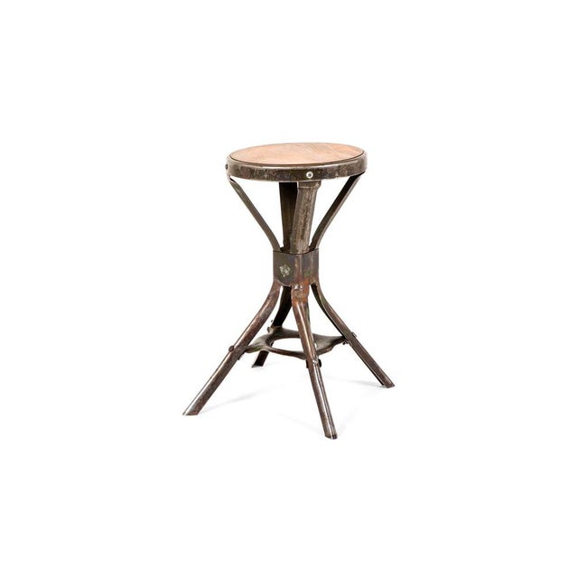 An industrial stool by the British manufacturing company Evertaut. This example retains the original pitch pine seat and...