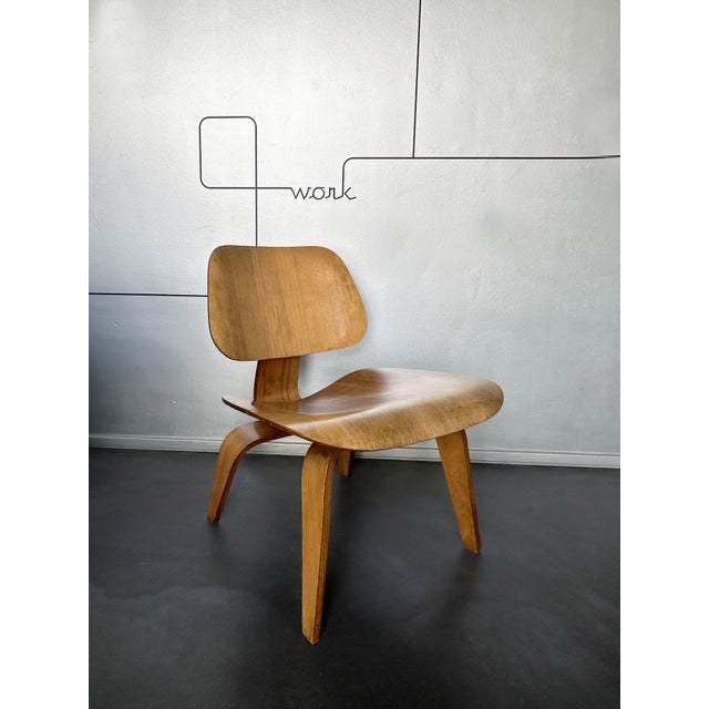 Original lcw (lounge chair wood) designed by charles and ray eames and produced by evans products company for herman...