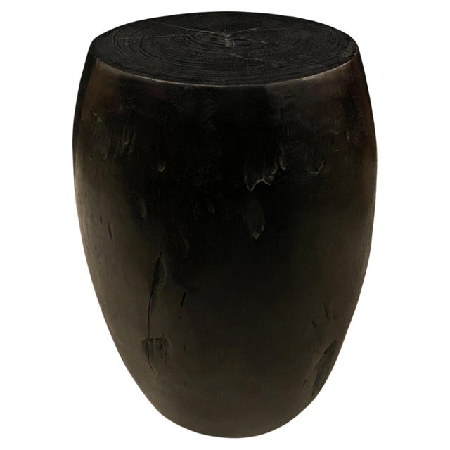 Reclaimed mango wood charred and hand carved into this stunning drum shape whilst respecting the natural organic wood....
