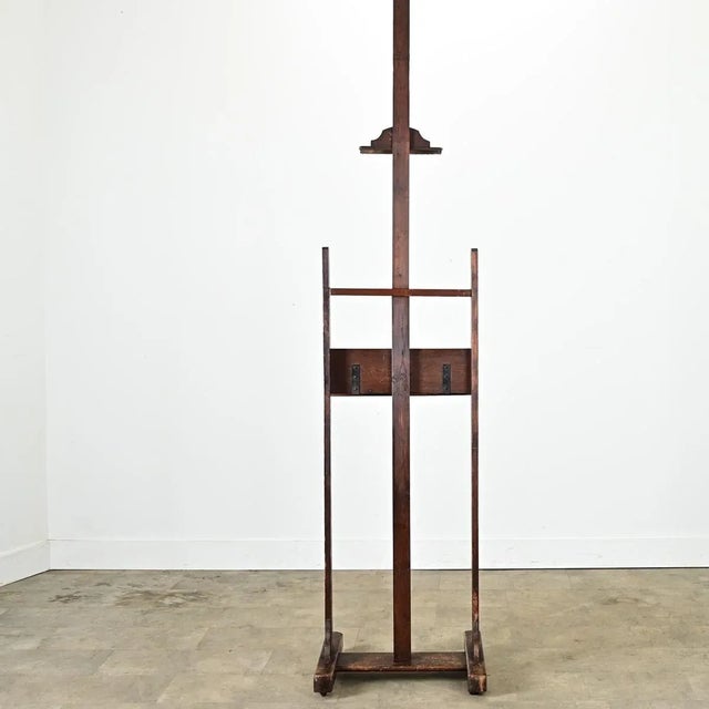 Dimensions: 103 ⅝” H x 23 ½” W x 21 ⅝” D This oak artist’s easel from turn of the century France (early 20th) is an...
