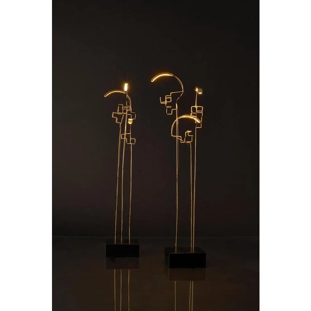 Boucle table lamp by éric de dormael dimensions: d 8 x w 8 x h 47 cm materials: aluminium, brass all our lamps can be...