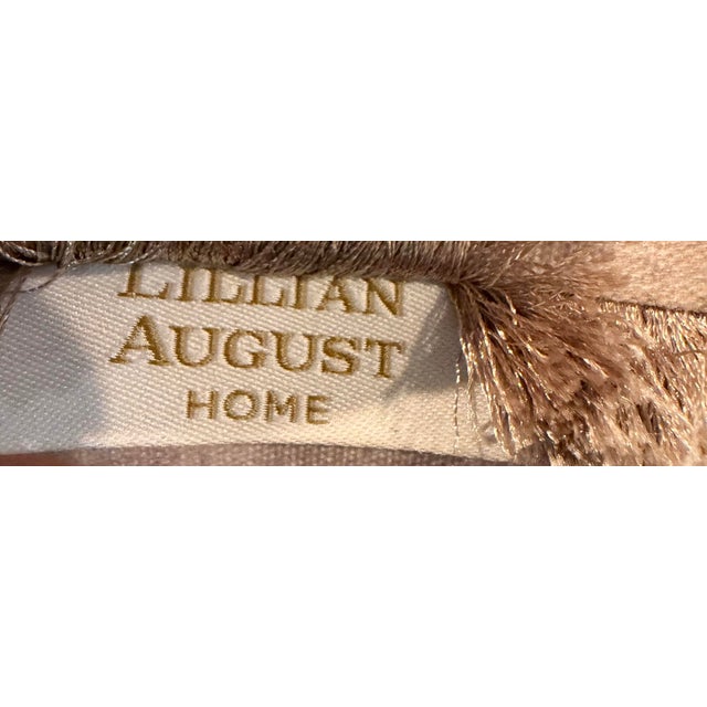 Decorative lumbar pillow by Lillian August Home featuring embroidered songbirds perched among flowering branches. Finished...