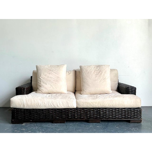 This vintage three-seat sofa exemplifies the refined casual luxury synonymous with Ralph Lauren design. Crafted from...