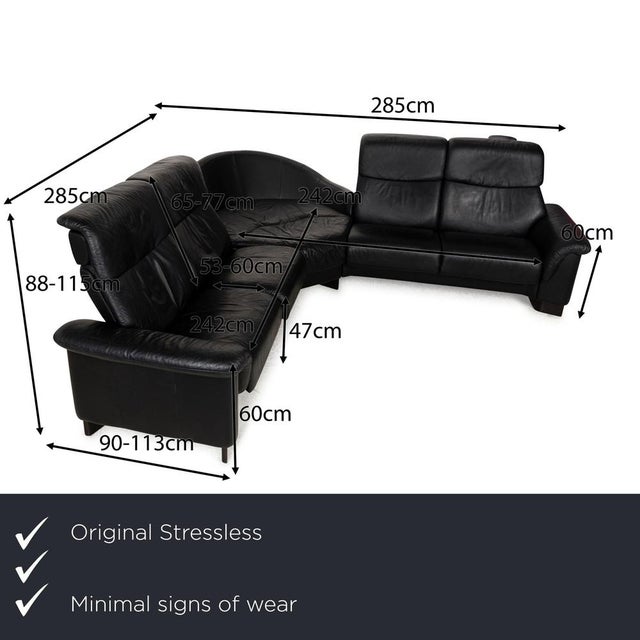 The Paradise sofa from Stressless is covered in black leather and stands on narrow, black wooden feet. It has numerous,...