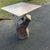 Wonderful Mixed media table, Steel base supports welded iron rods to the bottom of the stone table top. Very contemporary...