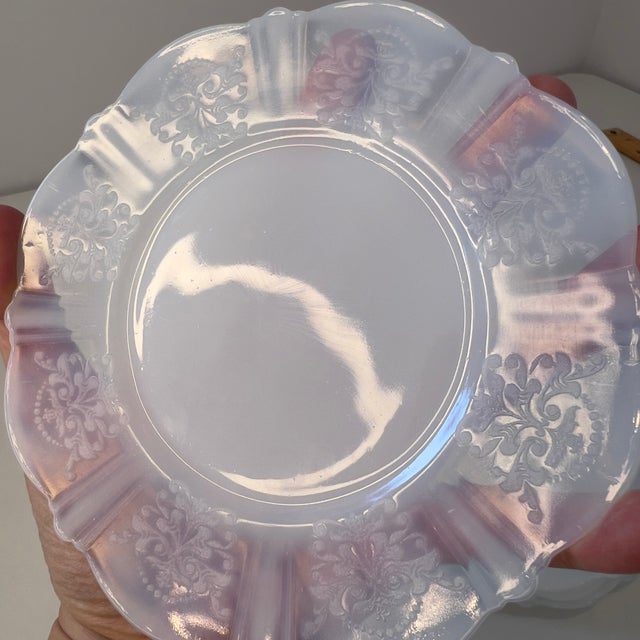Macbeth-Evans Monax dessert plates primarily feature an Art Nouveau decor style, characterized by soft, flowing floral...