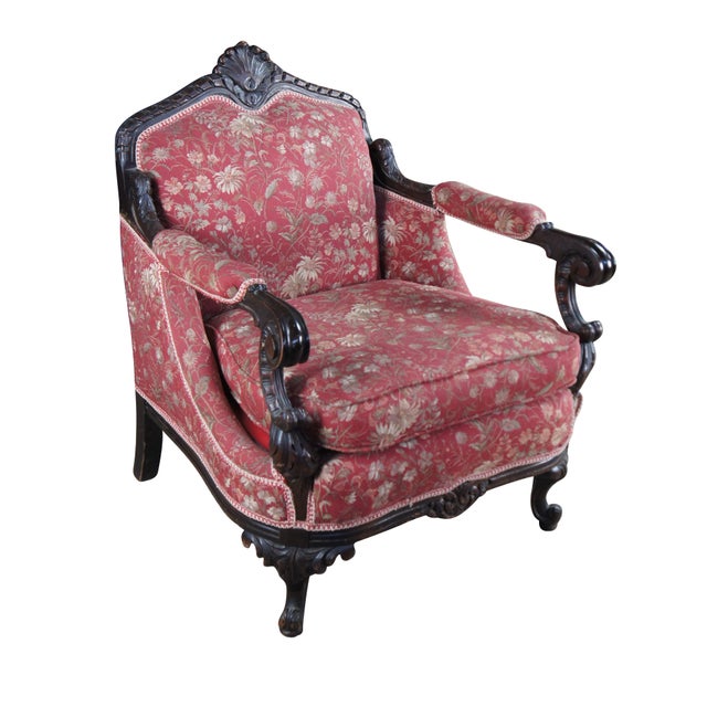 Antique Victorian oversized gentlemans parlor / fireside / club / lounge arm chair. Made of mahogany featuring highly...