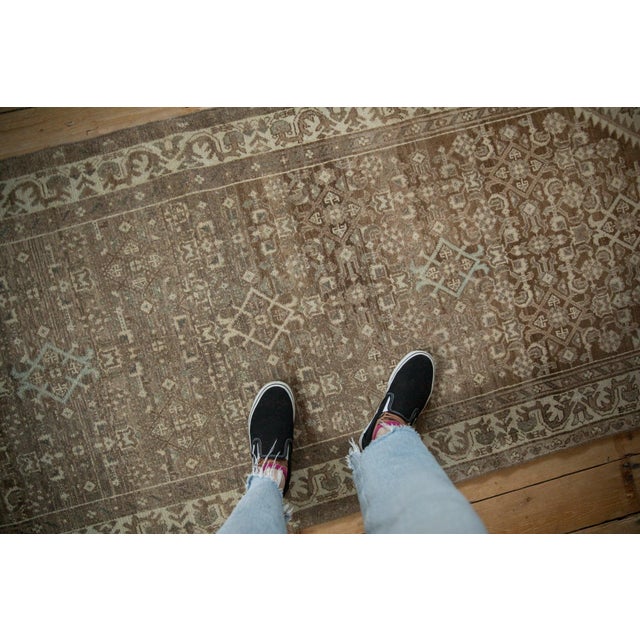 :: Allover covered field in a Herati motif with abrashes across. Colors and shades include: Pale coffee brown, ivory,...