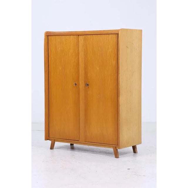 Product details beautiful vintage cabinet by wilhelm höltkemeyer from the 60s with many compartments features * timeless...
