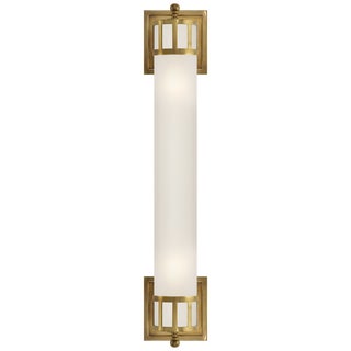 Visual Comfort Signature Openwork Long Sconce in Hand-Rubbed Antique Brass with Frosted Glass For Sale