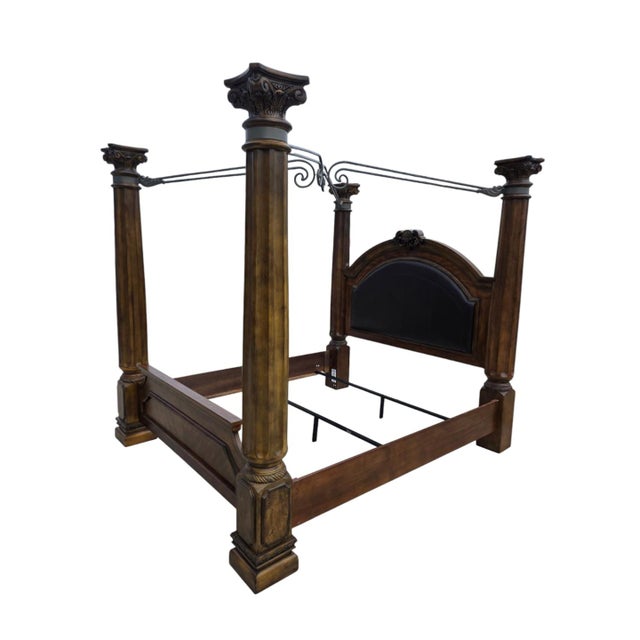 Elegant and substantial king-size four poster bed featuring tall fluted columns and rich wood finish. Classic proportions...