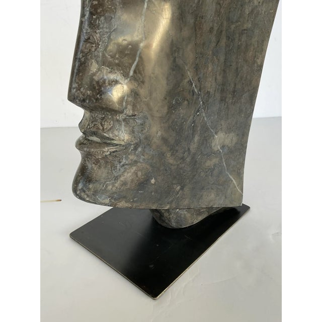Stylish Modern Dark Gray Marble Profile Sculpture, black metal stand, showroom floor sample