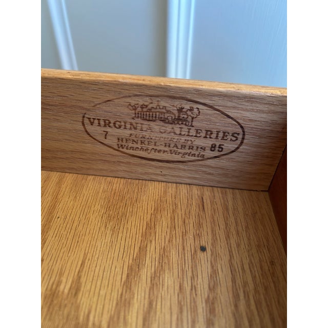 Beautiful reproduction piece with dovetailed construction and solid brass hardware with four, roomy drawers. It has oval...