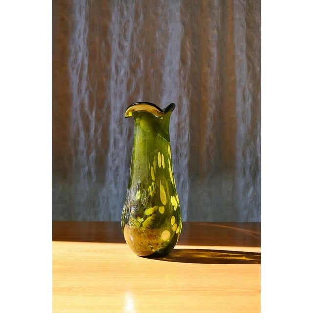 A distinctive hand-worked studio glass vase by hungarian master glassblower gyula budveszel , dating from the 1990s. The...