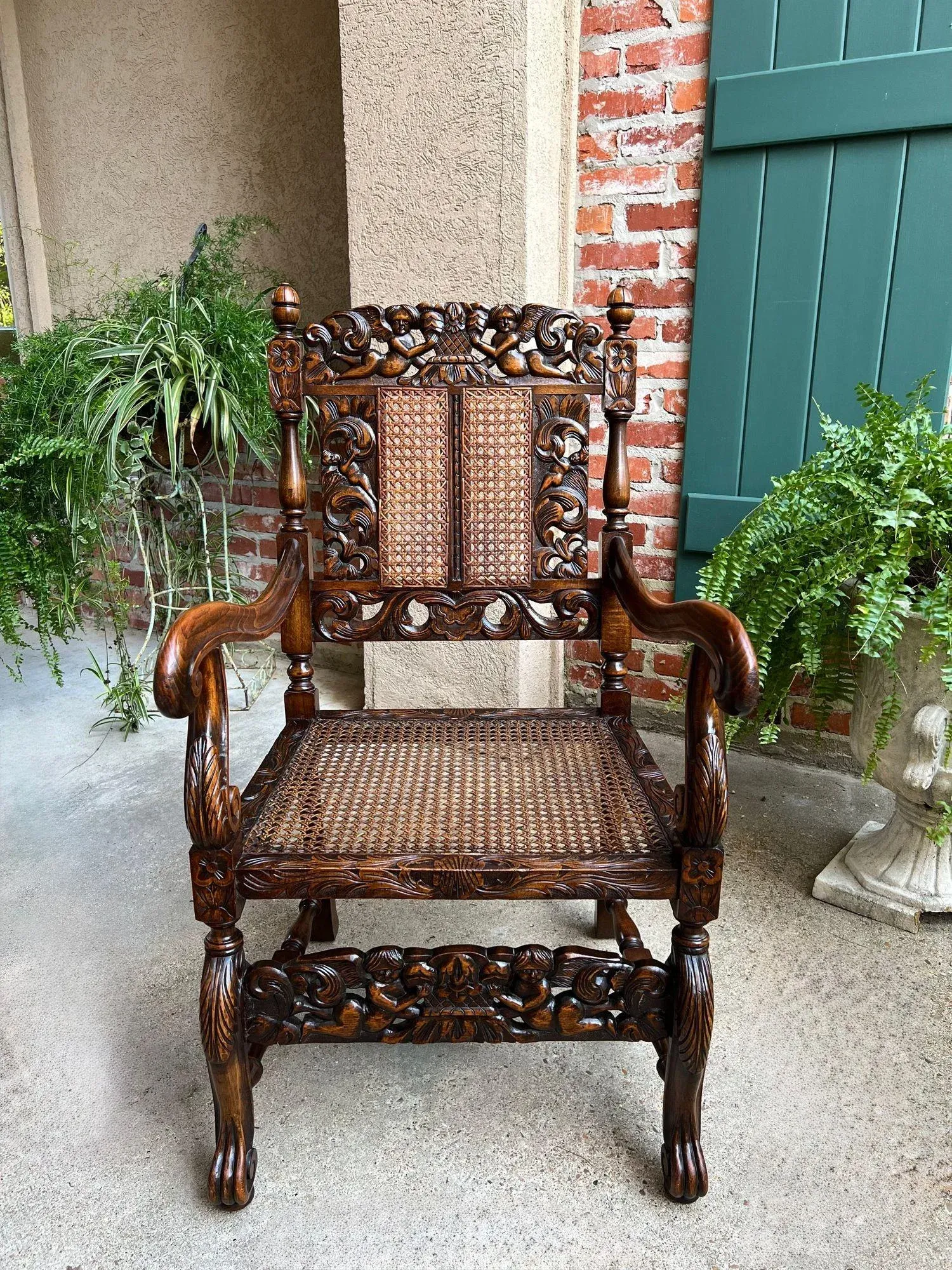 Antique English Arm Chair Carved Oak Cane Seat Renaissance Cherubs