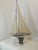 Beautiful and charming toy pond yacht sailboat from the 1950s. Made by Valberan Milano. Hull entirely made of aluminum and...