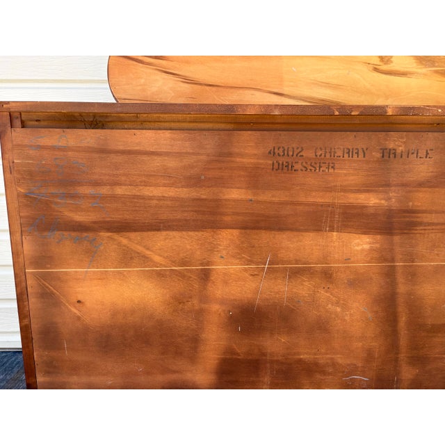 Burgundy Vintage 1940s Solid Cherry 12-Drawer Serpentine French Provincial Triple Dresser and Matching Mirror Set For Sale - Image 8 of 12