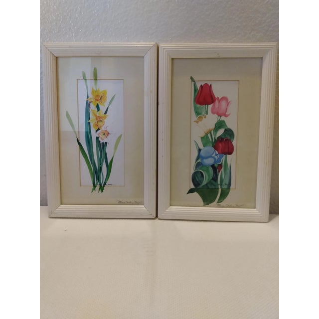 Elegance is in full flower when you add this pair of vintage floral paintings. Three beautiful daffodils. Five tulips of...