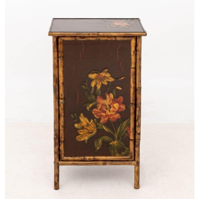 Chinese Bamboo and Painted Lacquer Panel Cabinet, the single door opening to two shelves. 35.5" H x 20.5" W x 14.5" D....