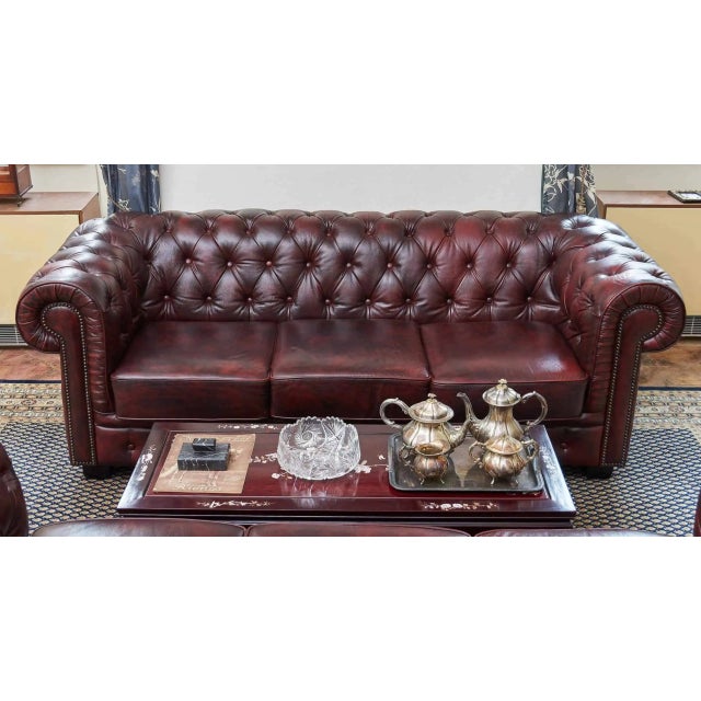 Top model of comfortable Chesterfield sofas made of cowhide. Three-seater sofa with a beautiful patina. Model with three...