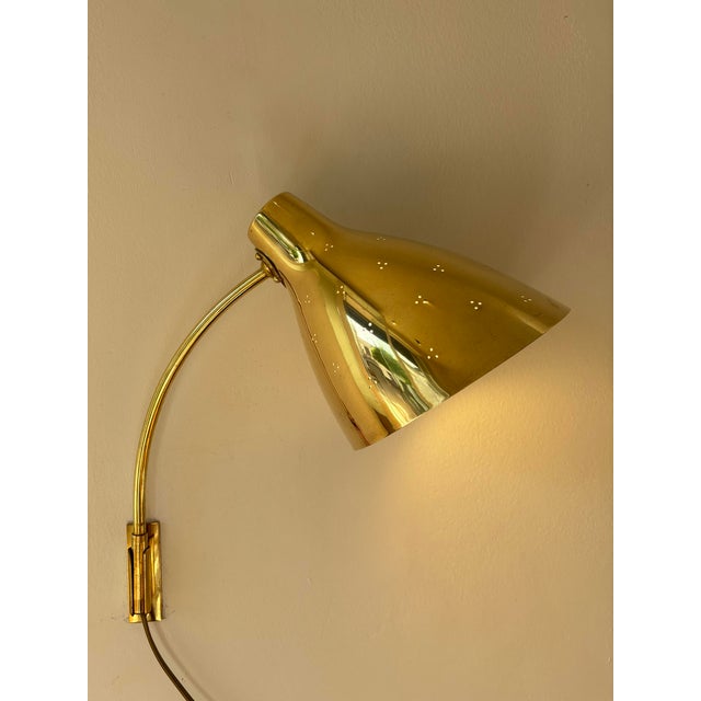 Model 50-055 Wall Lamp by Lisa Johansson-Pape for Orno, 1950s, in Flawless conditions. Designed 1950 to 1959 I have...