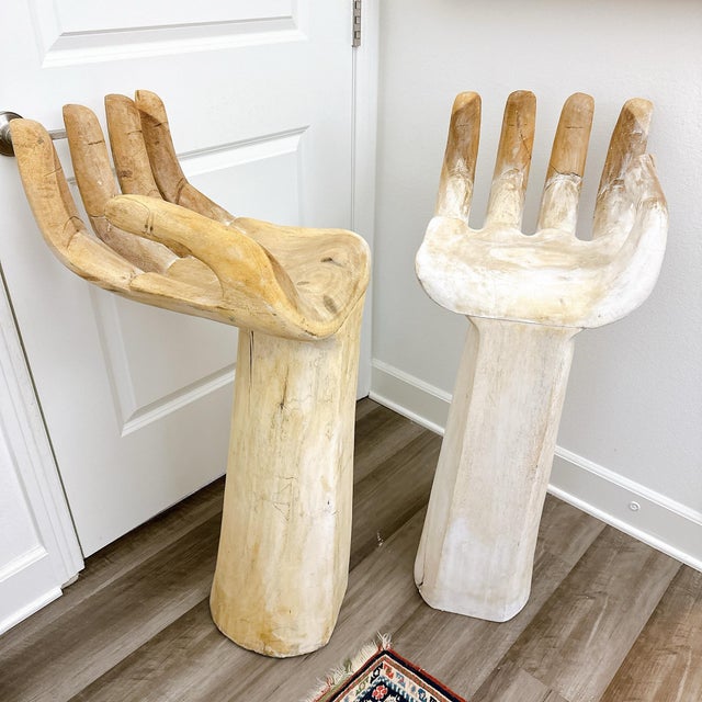 A cool and unique piece in the shape of one of a kind hand chairs in the Style of Pedro Friedeberg. More like art but...