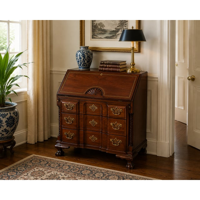 A beautifully crafted early 20th century Federal Revival secretary desk, executed in richly grained mahogany with refined...