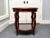 A Baker Milling Road mahogany round side table with a beautifully polished round top, gracefully curved bracket legs and...