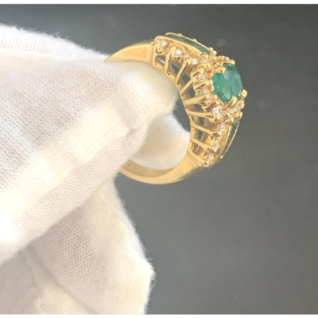 1 Carat Oval Cut Emerald and 1.0 Carat Diamond Ring 18 Karat Yellow Gold For Sale In New York - Image 6 of 18