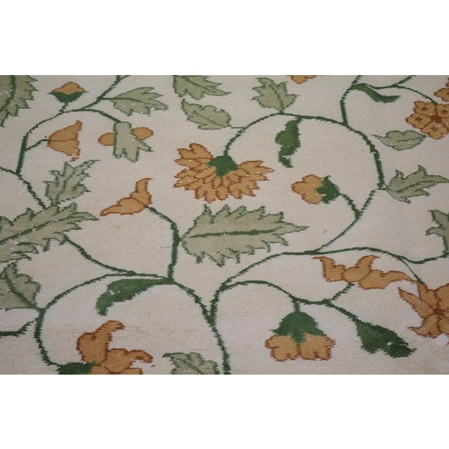 Hand-knotted with care using traditional rug-making techniques, this wool rug blends timeless craftsmanship with a modern...