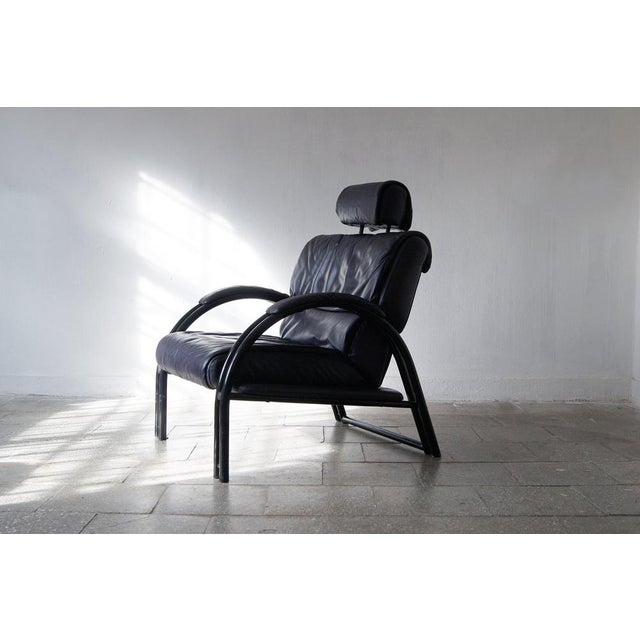 Timeless Italian Design. This leather armchair is a fantastic piece that effortlessly draws the eye. The metal tubular...