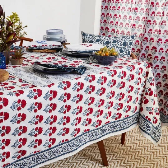 Hana features an old-style Indian flower motif, instantly eye-catching in bright red and ivory. A floral border in teal...