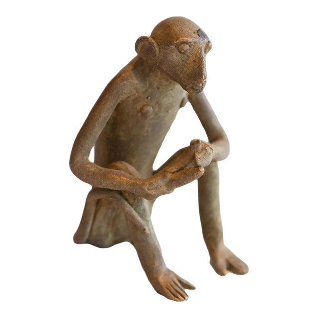 Vintage African Sitting Monkey With Banana Sculpture For Sale