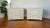 A sophisticated and exceptionally rare pair of Maitland-Smith leather-clad nightstands, beautifully crafted and fully...