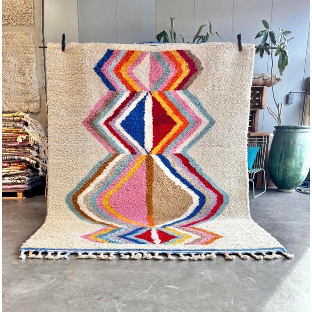 Add a burst of color and cultural charm to your home with our Colorful Moroccan Berber Beni Ourain Wool Rug. This handmade...