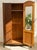 Early 20th Century Art Deco Oak Armoire With Curved Center Door For Sale - Image 9 of 11