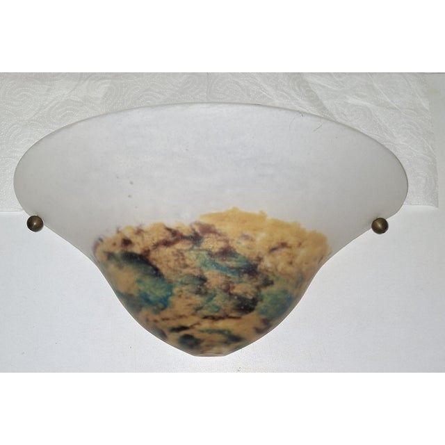 French Wall Lamp with Colored Glass Shade on a Brass Bracket, 1950s, in Very Good conditions. Designed 1950 to 1959...