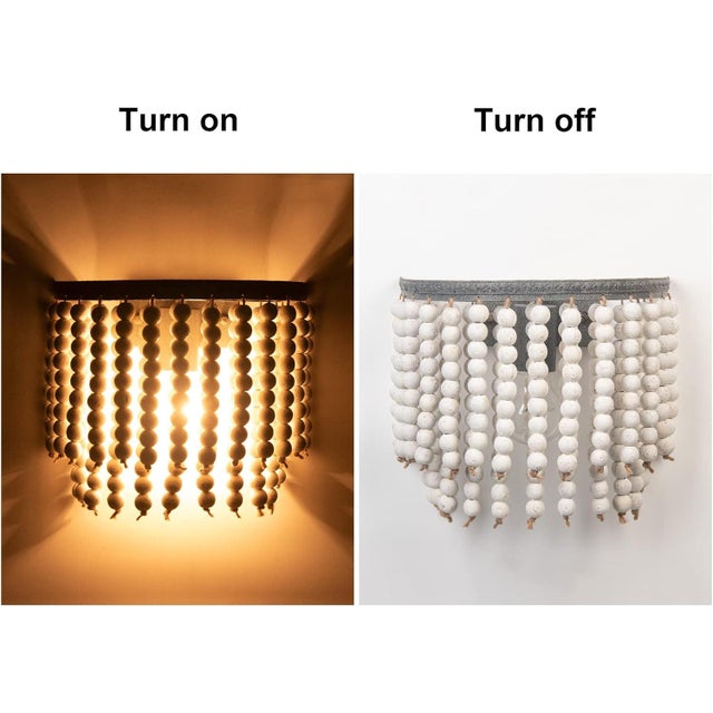 This set of two boho-style wall sconces features a charming combination of natural wooden beads and sturdy metal framing,...