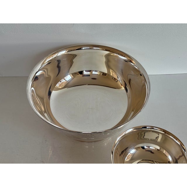 Pair of gorgeous Gorham silver-plate bowls on pedestals. Includes plastic inserts. Small bowl measures 5”Diameter x 2.75”H...