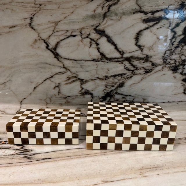 Vintage hand made in India pair of bone inlaid and resin nesting boxes. Crafted from a blend of resin and bone. The...