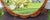 1940s Satinwood Oval Wall Mirror Carved French Flower Basket Crest Decorative Frame For Sale - Image 5 of 15