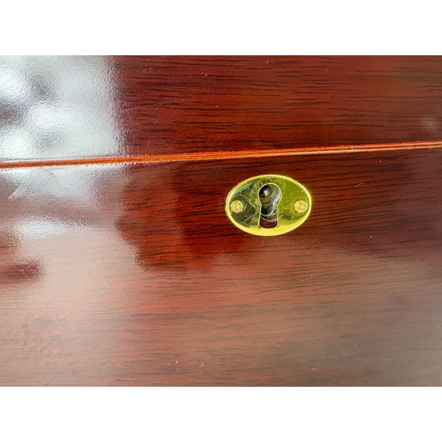 This is a vintage handcrafted cigar humidor. This humor has beautiful brass handles on either side with a beautiful brass...